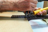 /album/in-the-shop/guitarrepair4-jpg/